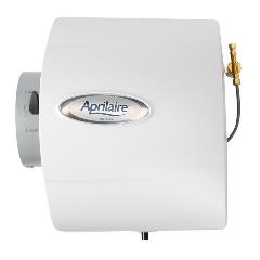 A large white humidifier with wall attachments